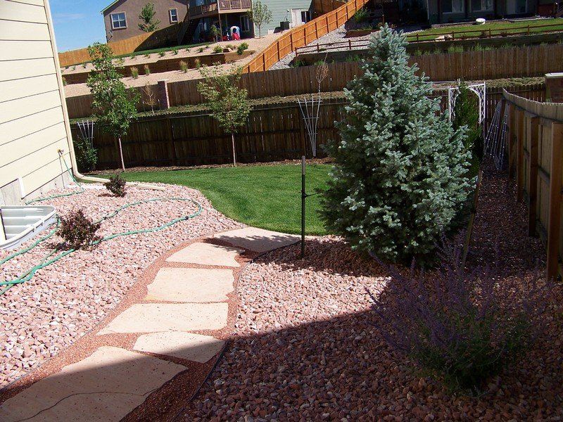 Backyard Pavement — Colorado Springs, CO — Green Thumb Commercial Grounds Maintenance Inc.