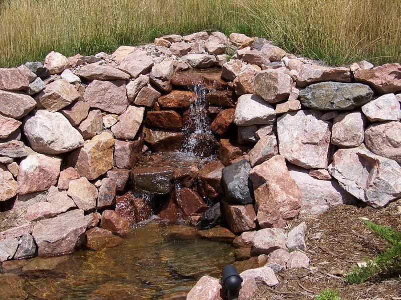 Creative Stone Pond — Colorado Springs, CO — Green Thumb Commercial Grounds Maintenance Inc.