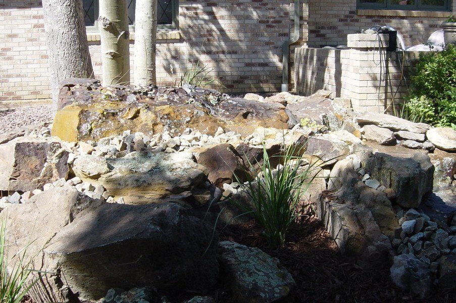Stone Pond Walls — Colorado Springs, CO — Green Thumb Commercial Grounds Maintenance Inc.
