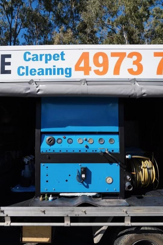 Blue Machine is Sitting on the Back of a Truck — Boyne Carpet Cleaning in Iveragh, QLD