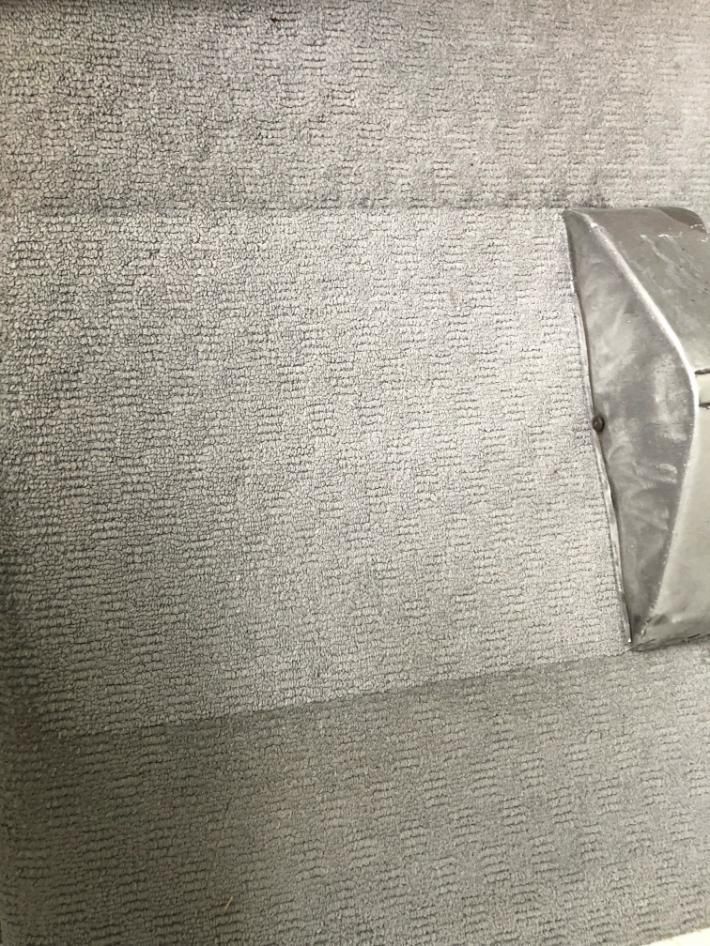 Close Up of a Carpet With a Pillow on It — Boyne Carpet Cleaning in Iveragh, QLD