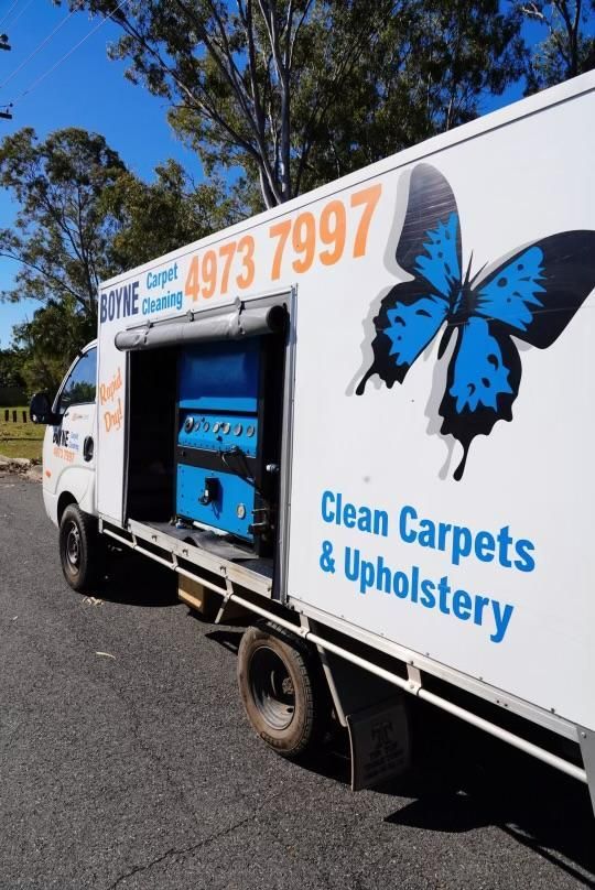Truck That Says Clean Carpets and Upholstery on the Side — Boyne Carpet Cleaning in Iveragh, QLD