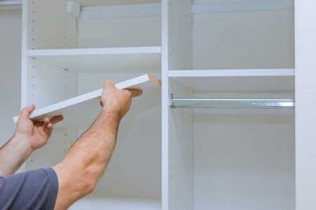 Man Installing a Closet — Alexandria, MN — Movintime