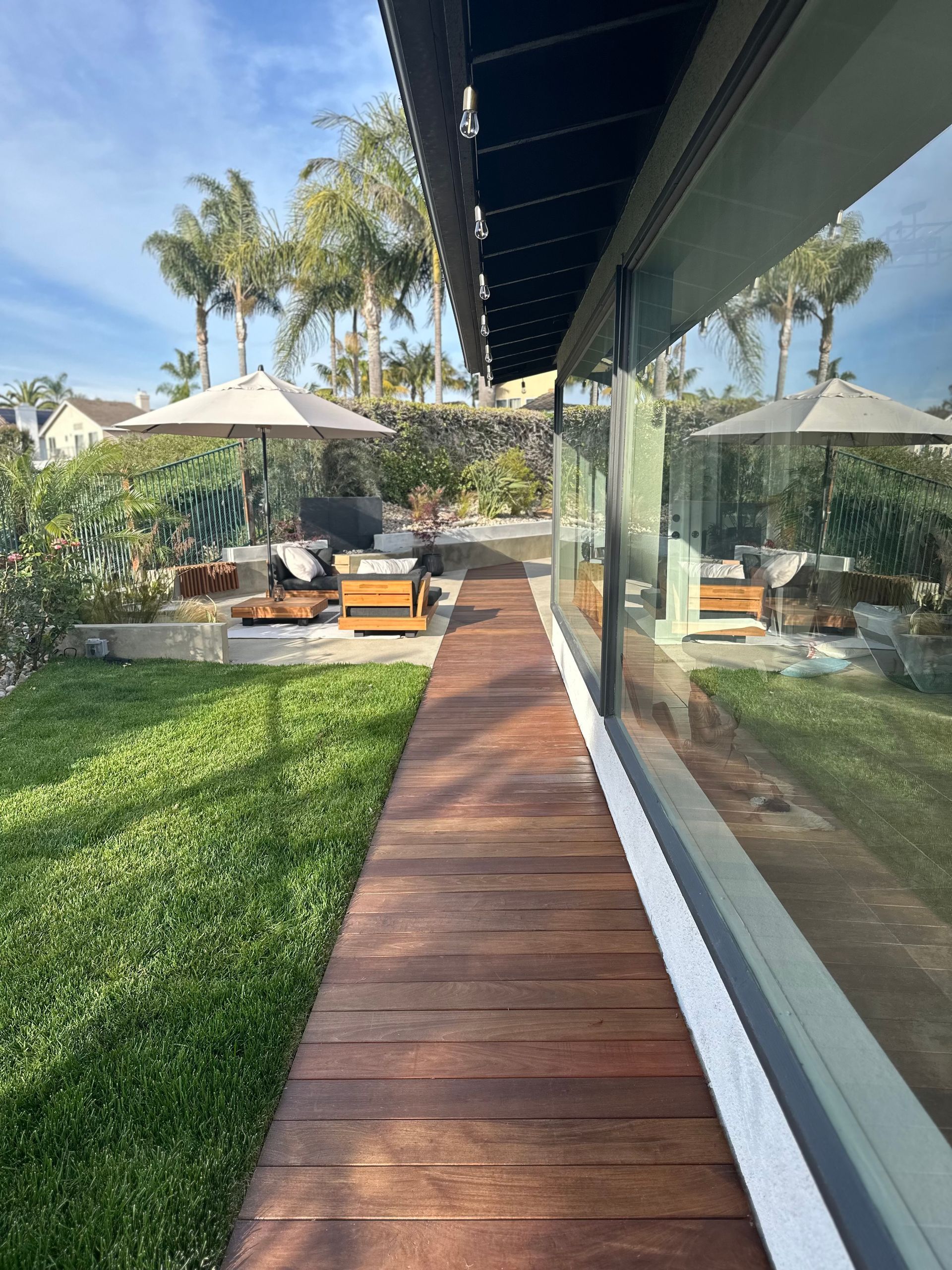 There is a bowl of fruit on the counter in the kitchen. There is a bowl of fruit on the counter in the kitchen.