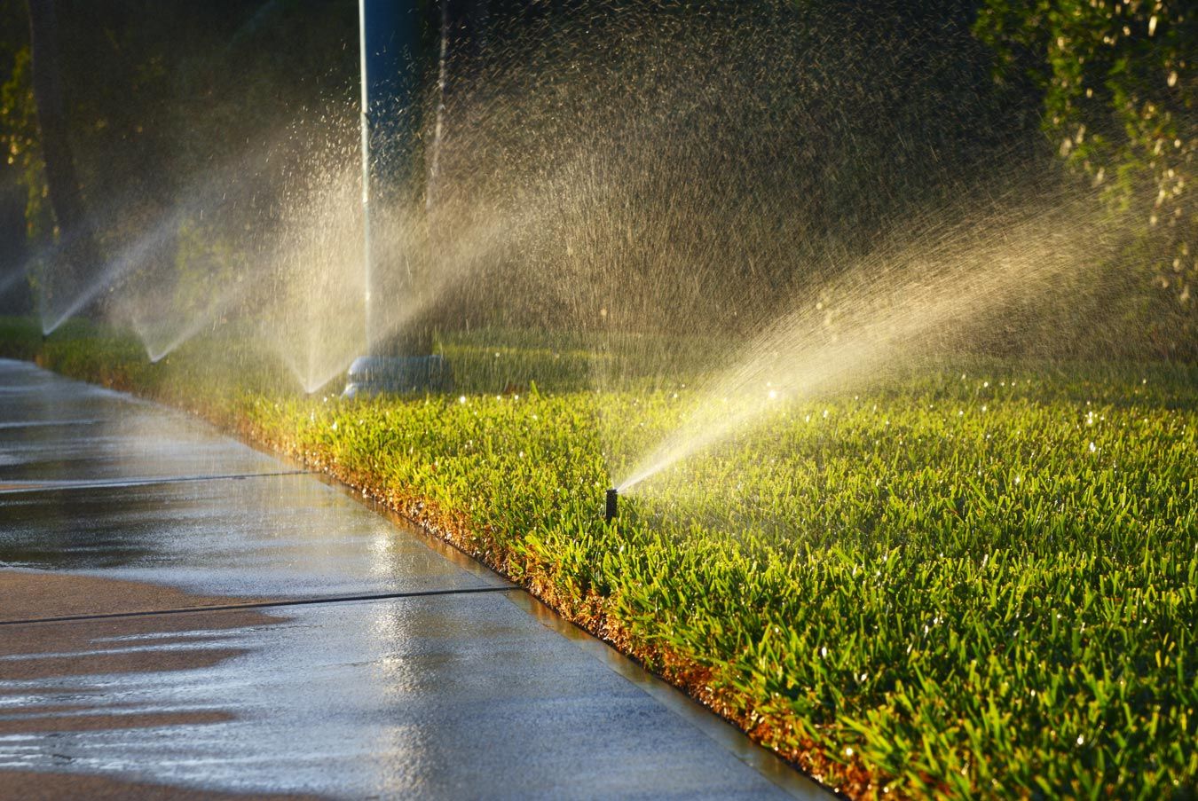 Sprinklers Watering Lawn — Decatur, IL — Keeping It Green Irrigation