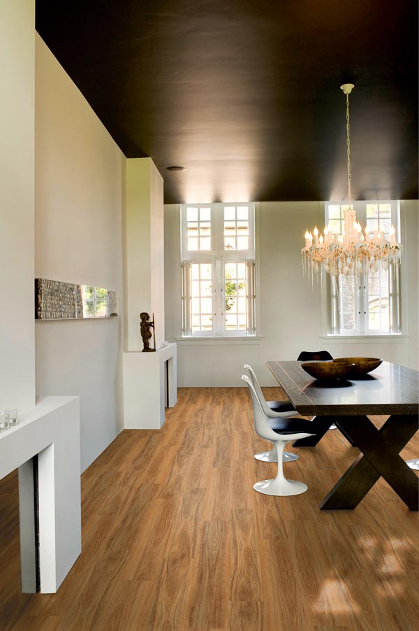 modern dining room with vinyl plank flooring by Titan Hybrid