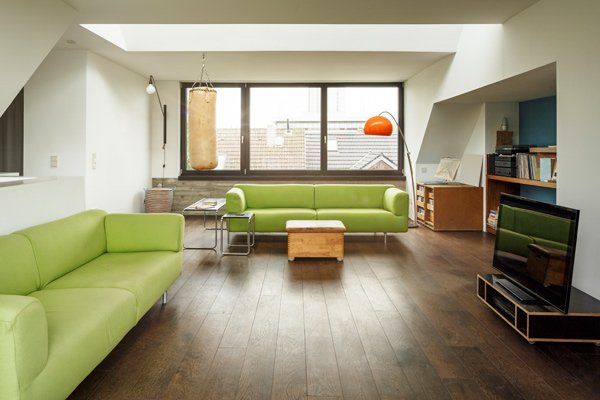 wide laminate plank flooring in modern studio