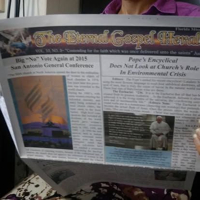 A person is reading a newspaper titled the eternal gospel home