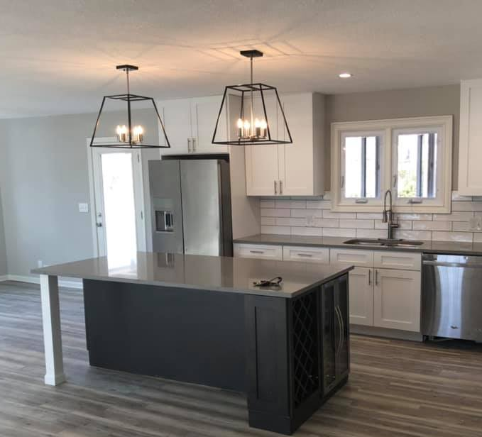 thin black granite countertop on kitchen island, countertop inspiration from under pressure