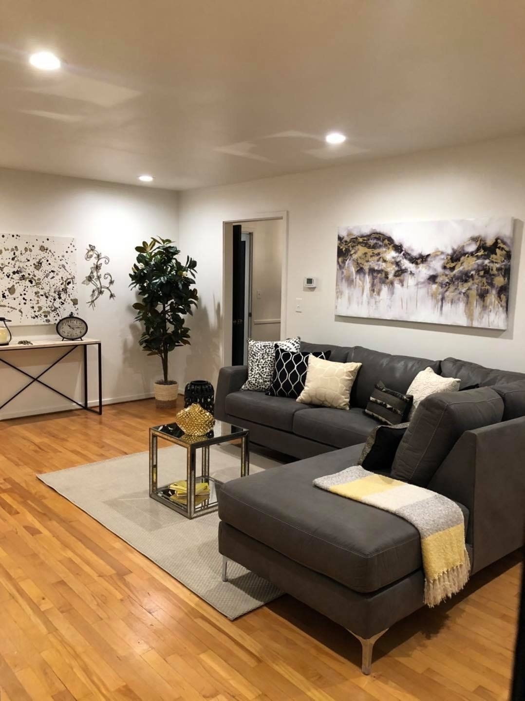 staged living room with l-shaped couch in Kansas City