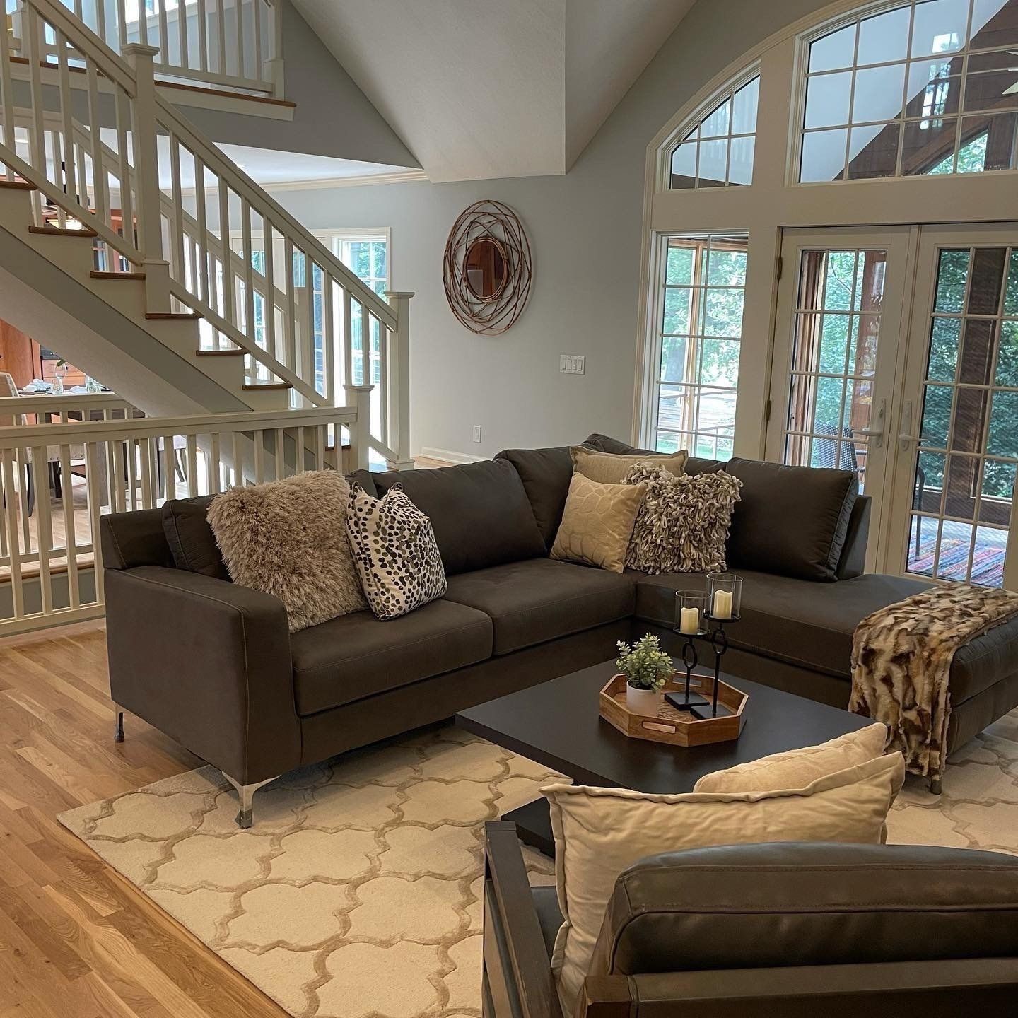 open living room iwth brown furniture staged in Kansas city