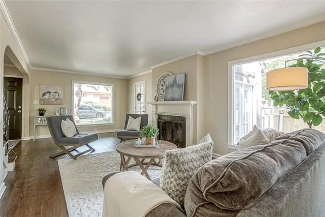 full-sized bed in staged bedroom with teal bed sheets