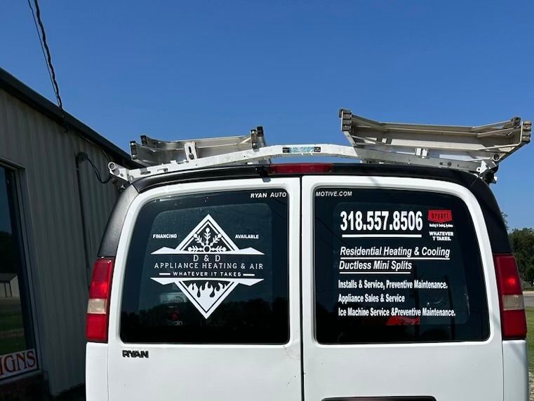 A white van with a ladder on top of it