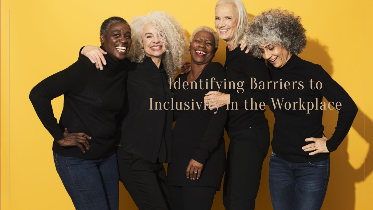 Five women in black tops and jeans embrace, smiling against a yellow backdrop. Text: 
