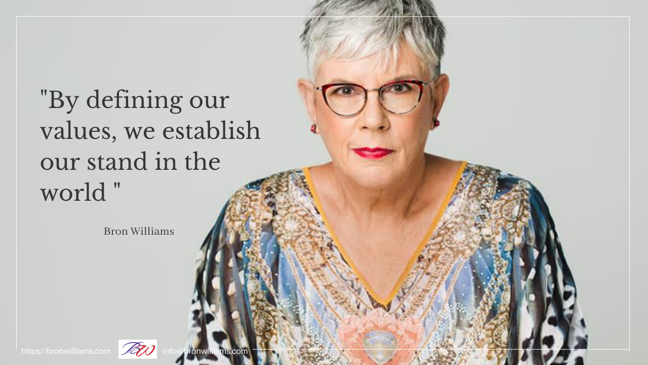 Woman with glasses and a patterned top, quote 