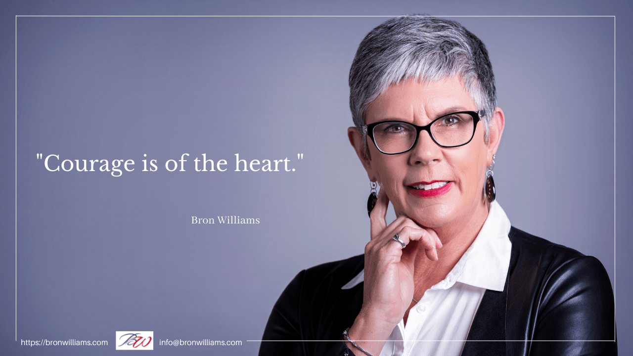 Woman in glasses, black jacket, quote 