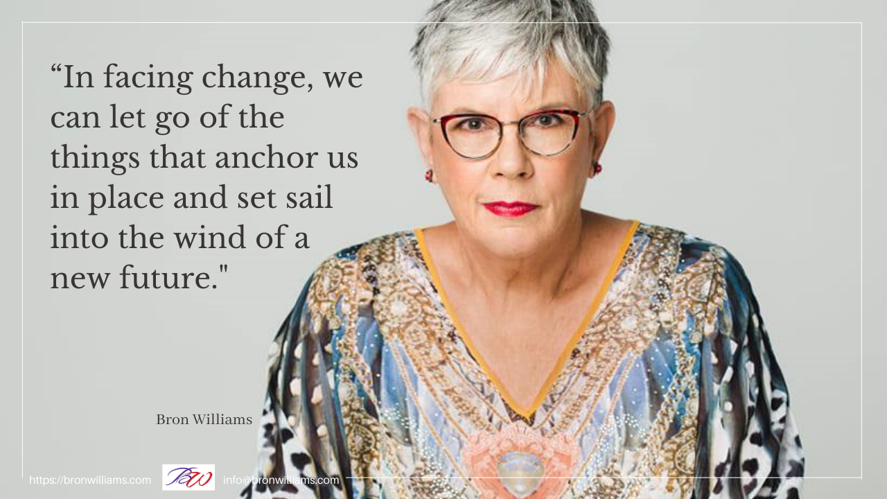Woman with glasses and a quote about embracing change.