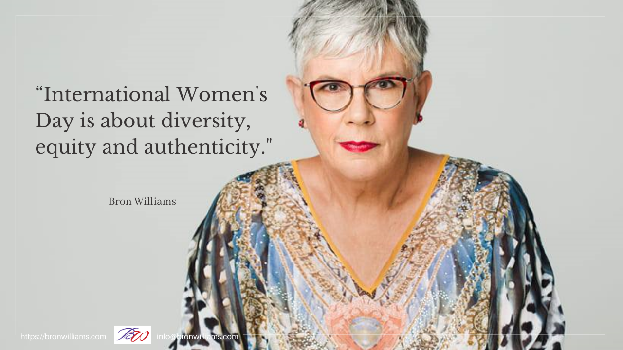 Woman with glasses in ornate top, quote reads 