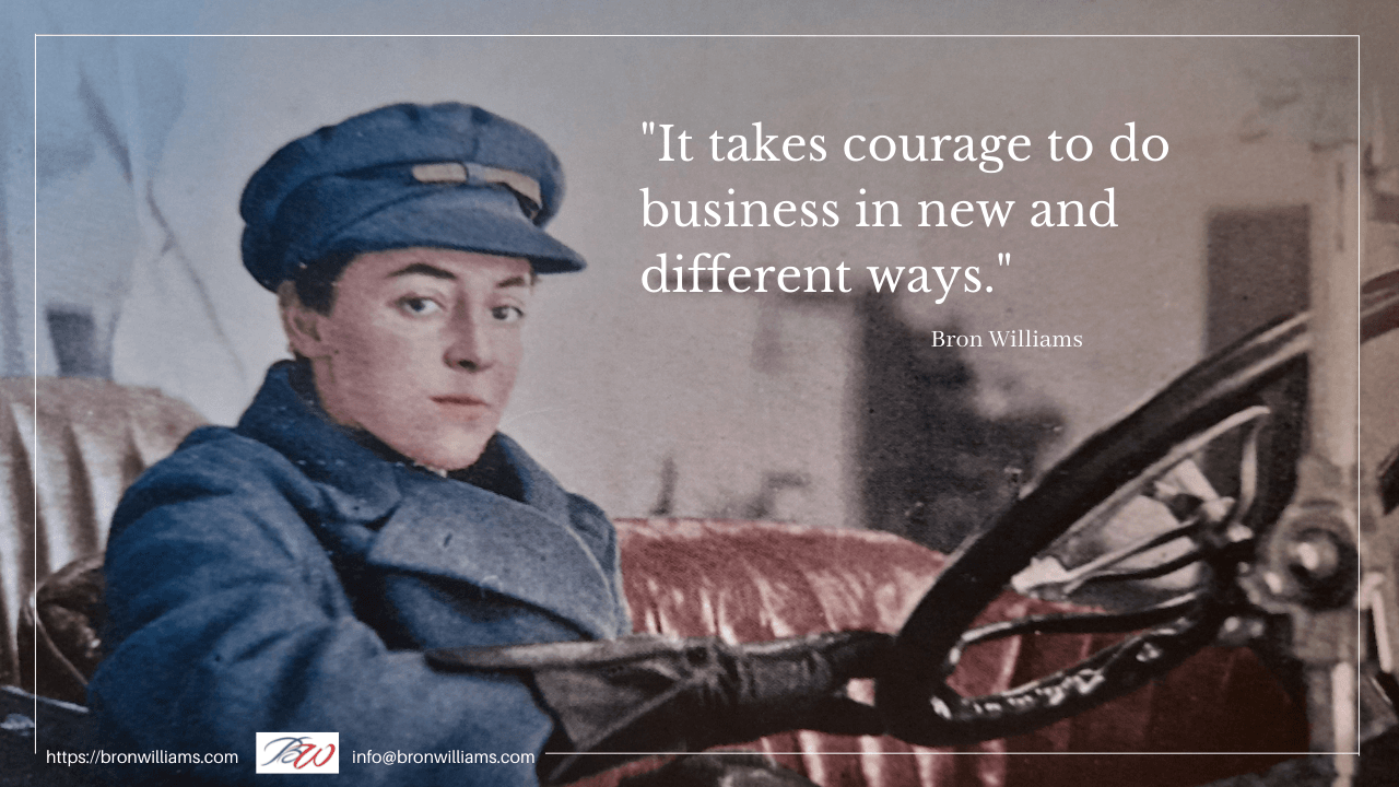 Woman in blue coat and hat driving a vintage car; quote: 