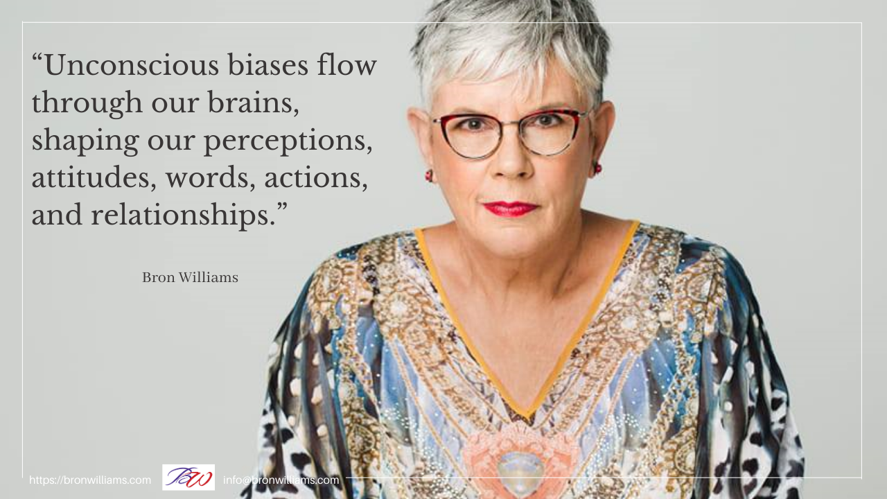 Woman wearing glasses with quote about unconscious biases.