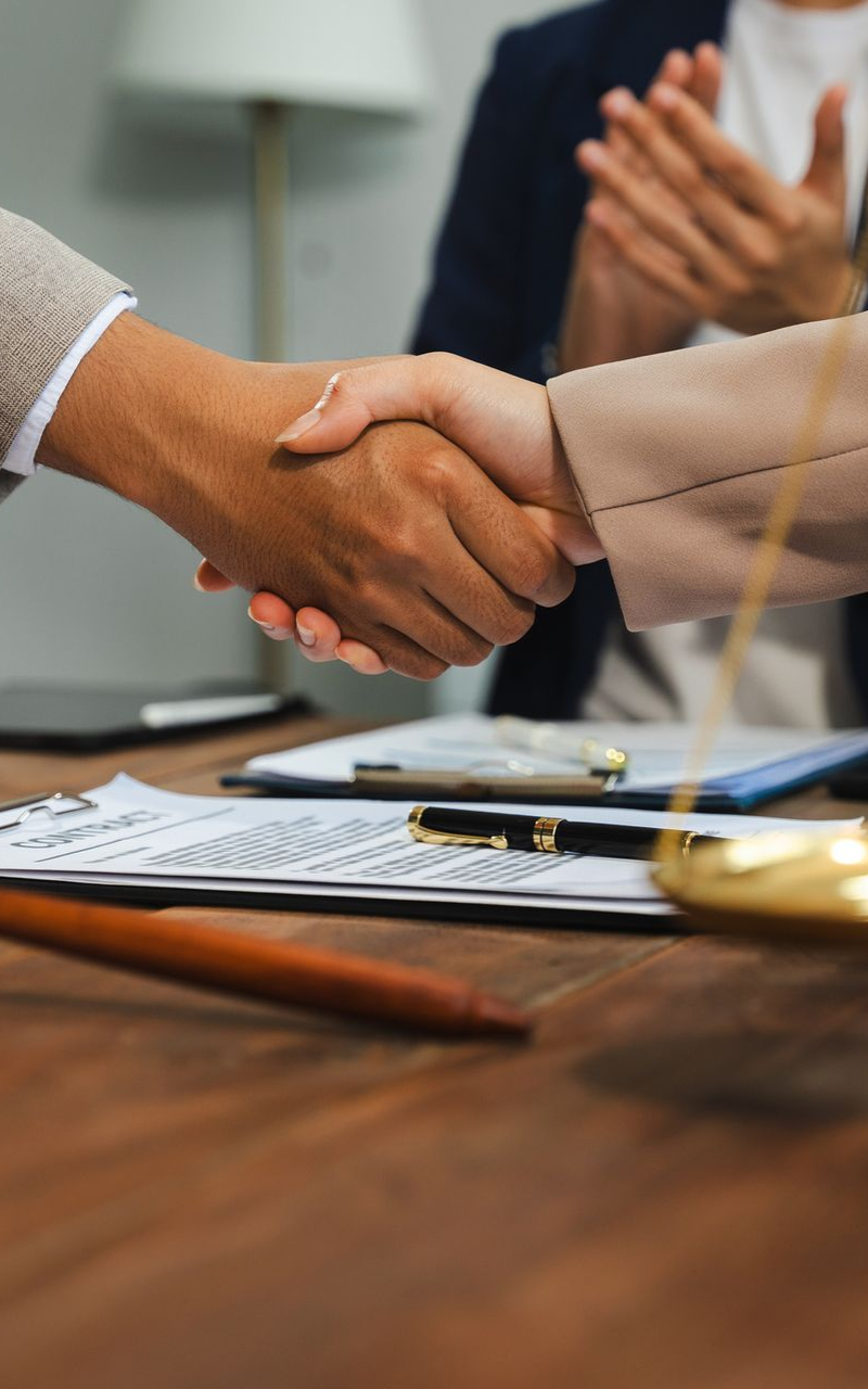 two people shaking hands