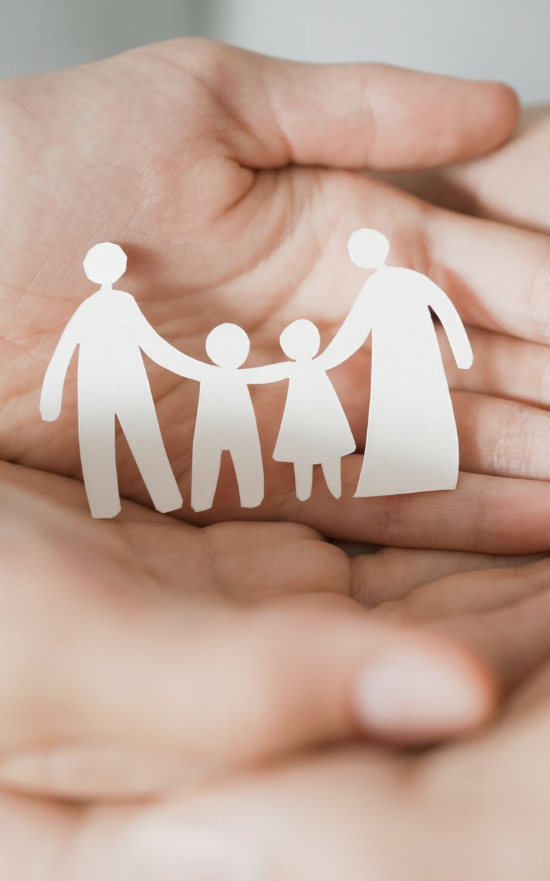 a cutout of a family of four
