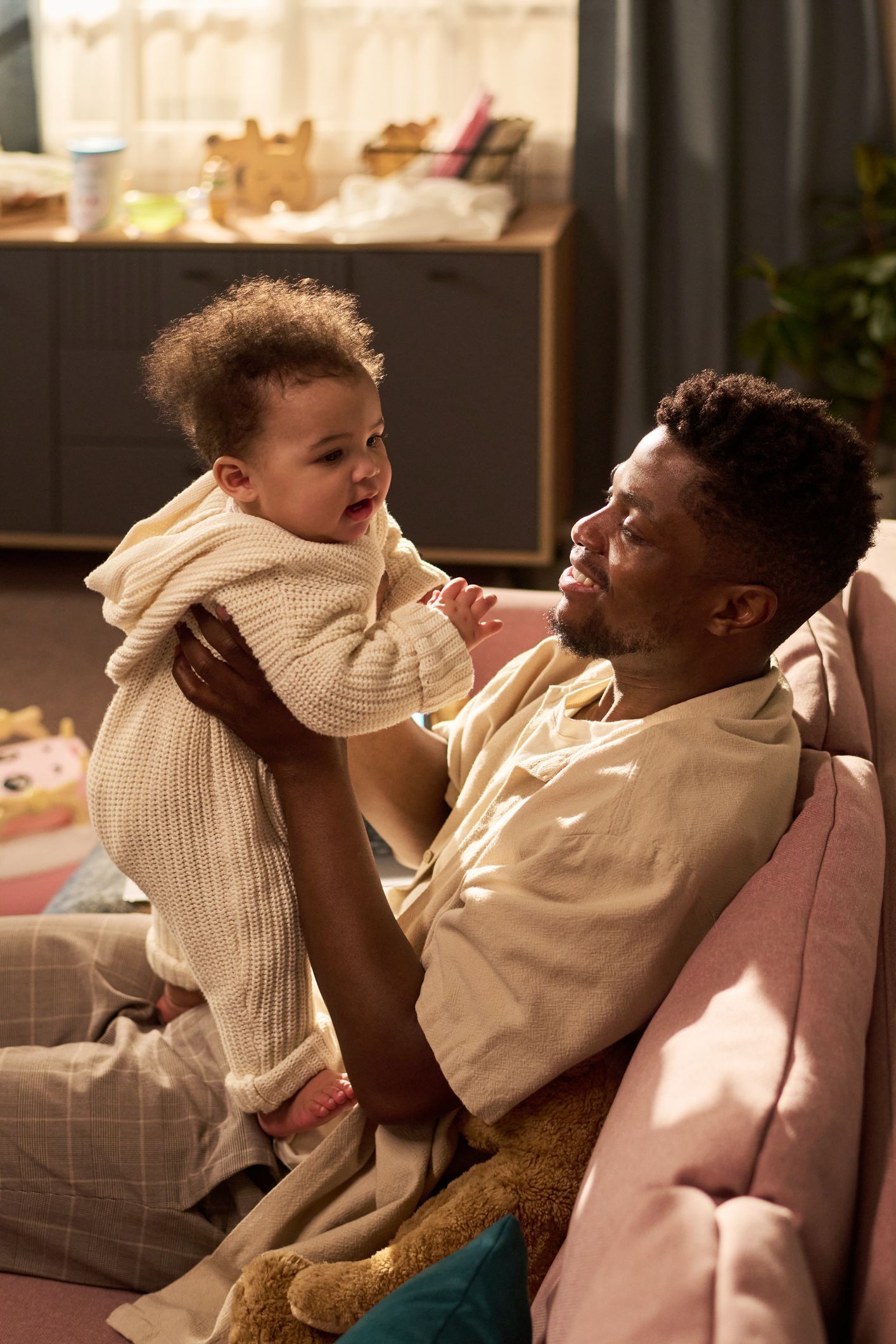 a father holding his baby