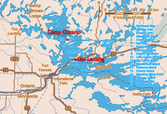 Map of a lake with islands, roads, and labeled camps in blue water and tan land