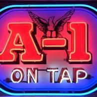 A red neon sign reading 