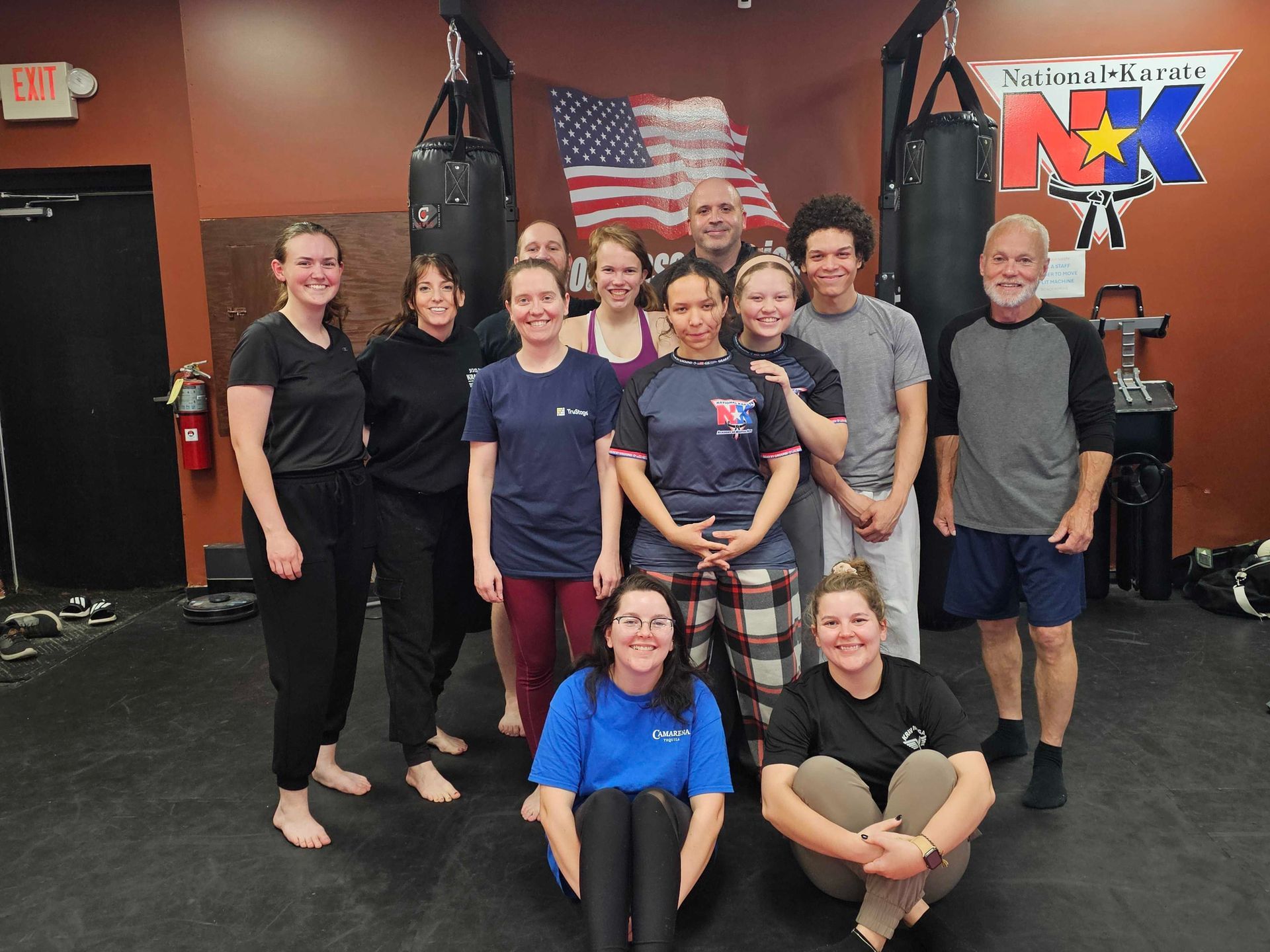 Adults practicing Karate drills at Wisconsin National Karate in New Berlin, WI, building calm focus and resilience.