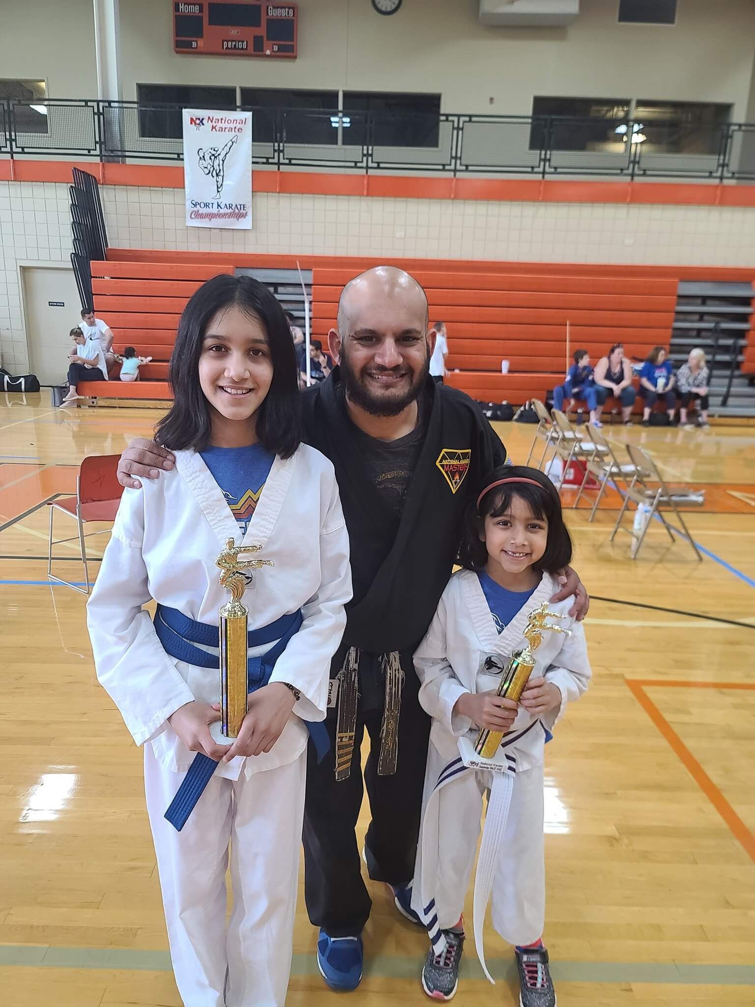 Adults practicing Karate drills at Wisconsin National Karate in New Berlin, WI, building focus, fitness, and discipline.