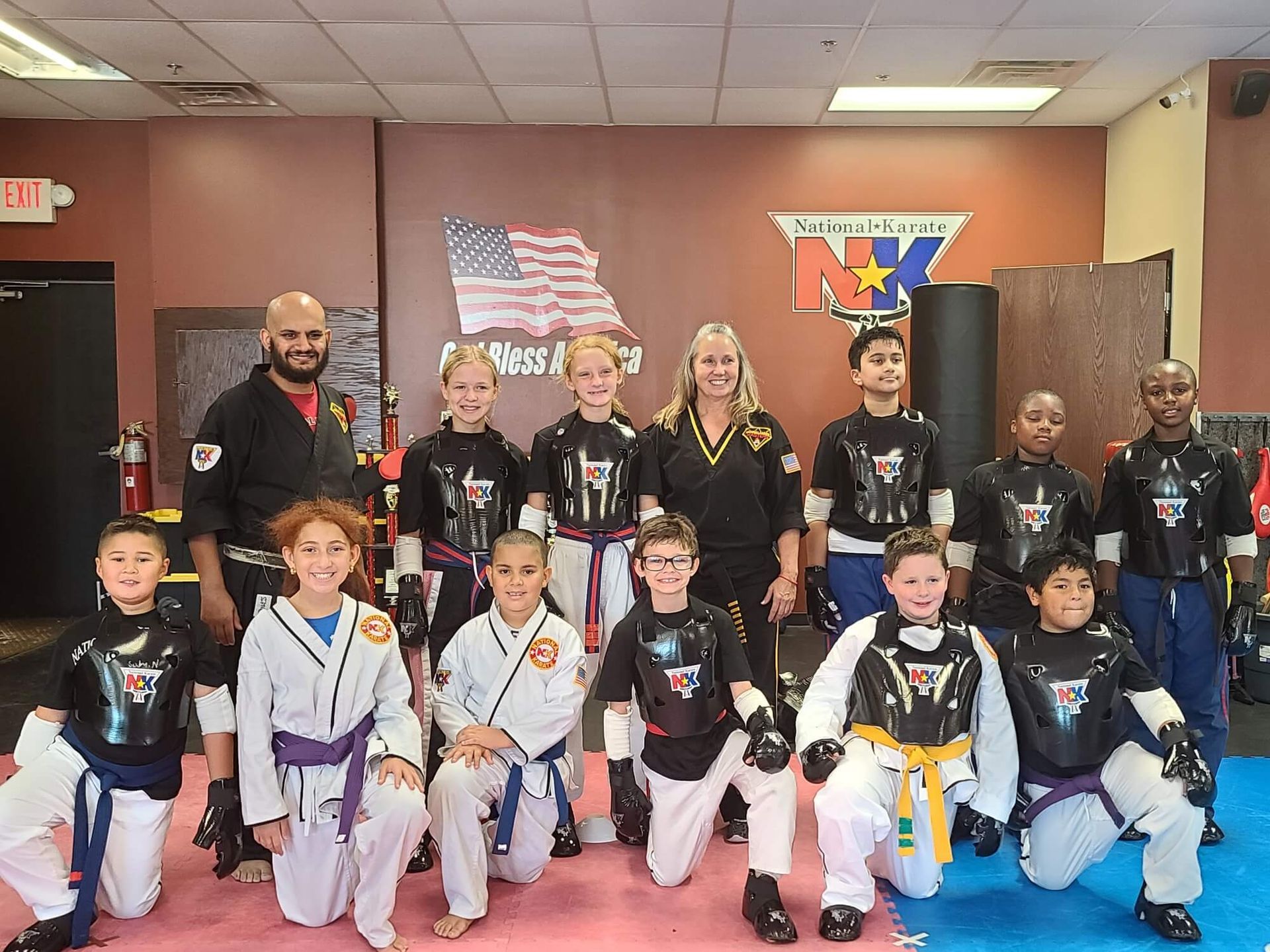 Teens practice Karate drills at Wisconsin National Karate in New Berlin, WI, building leadership, focus, and confidence.