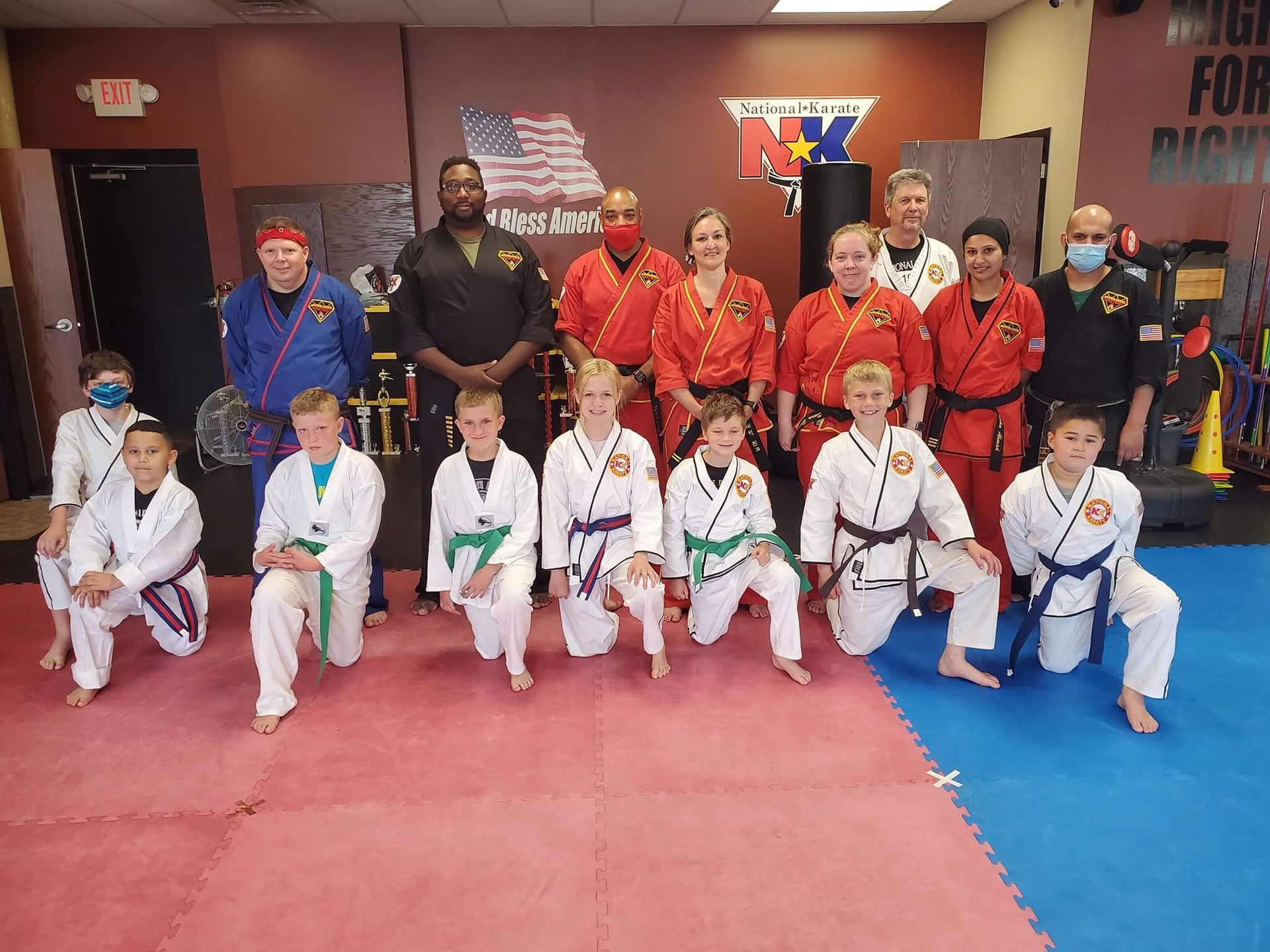 Kids practicing partner drills at Wisconsin National Karate Kickboxing & Krav Maga in New Berlin, WI to build friendships.