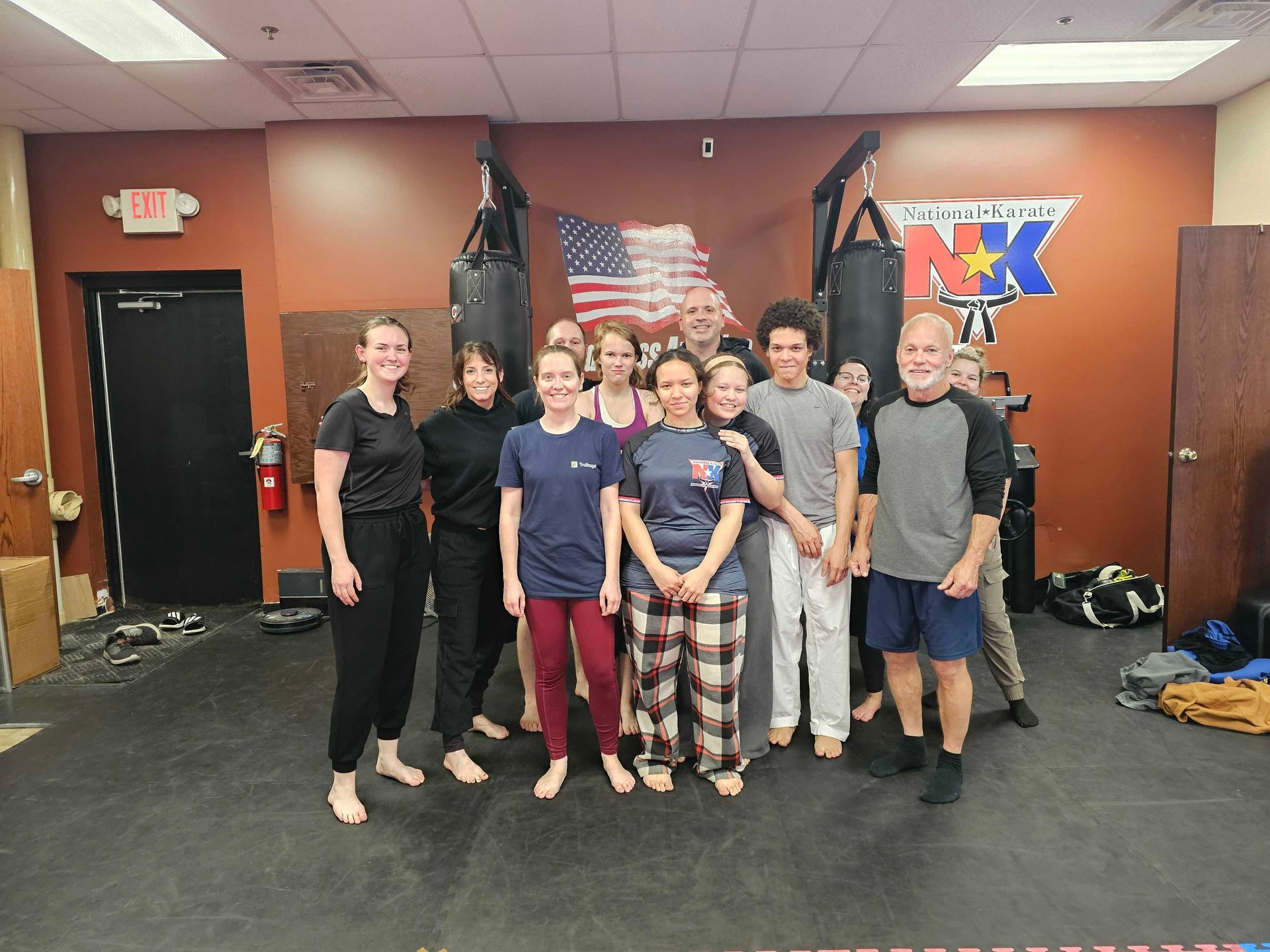 Women practicing Karate self-defense drills at Wisconsin National Karate Kickboxing & Krav Maga.