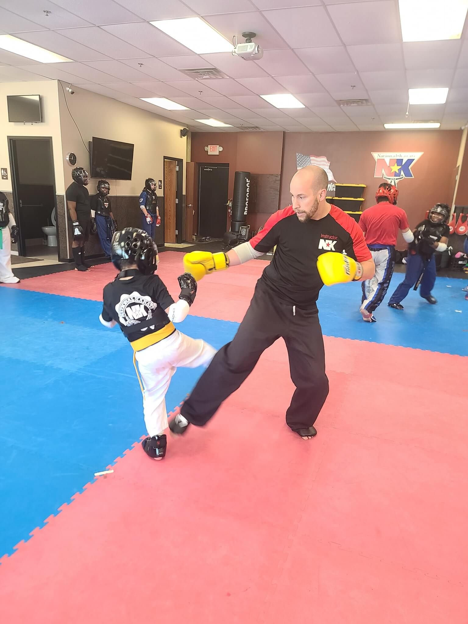 Kids practicing karate drills at Wisconsin National Karate Kickboxing & Krav Maga in New Berlin, WI, building focus and confidence