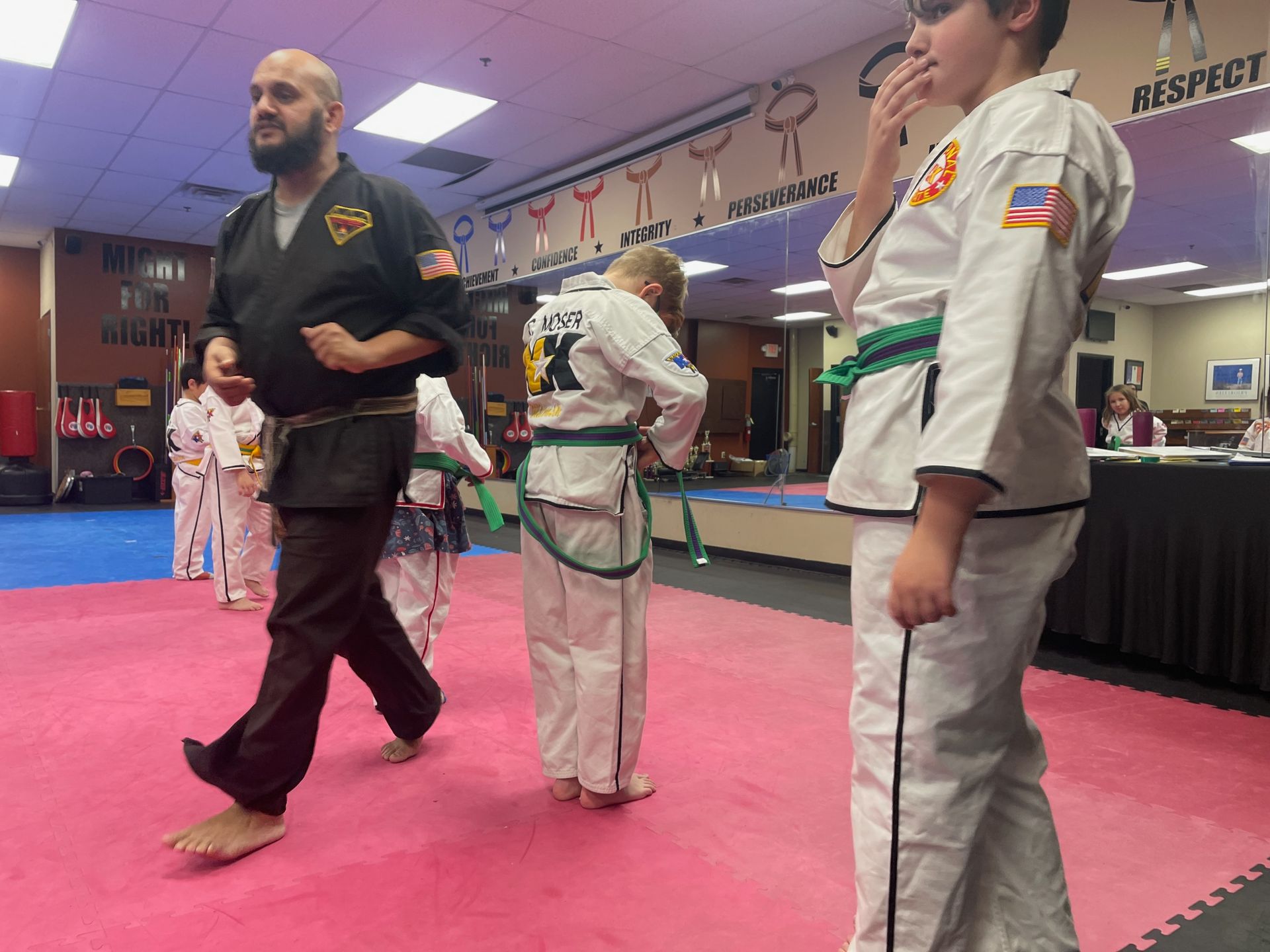 Kids practice controlled sparring at Wisconsin National Karate Kickboxing & Krav Maga in New Berlin.