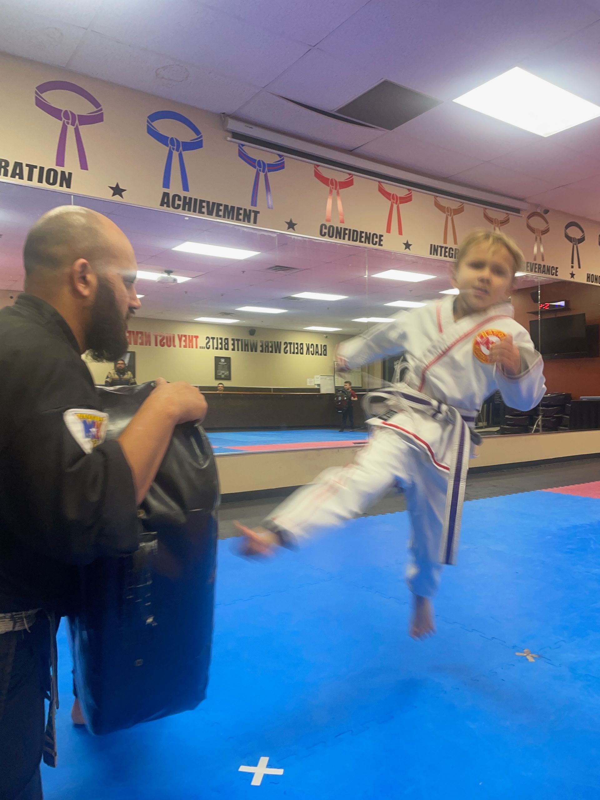 Kids practice karate basics at Wisconsin National Karate Kickboxing & Krav Maga in New Berlin, WI.