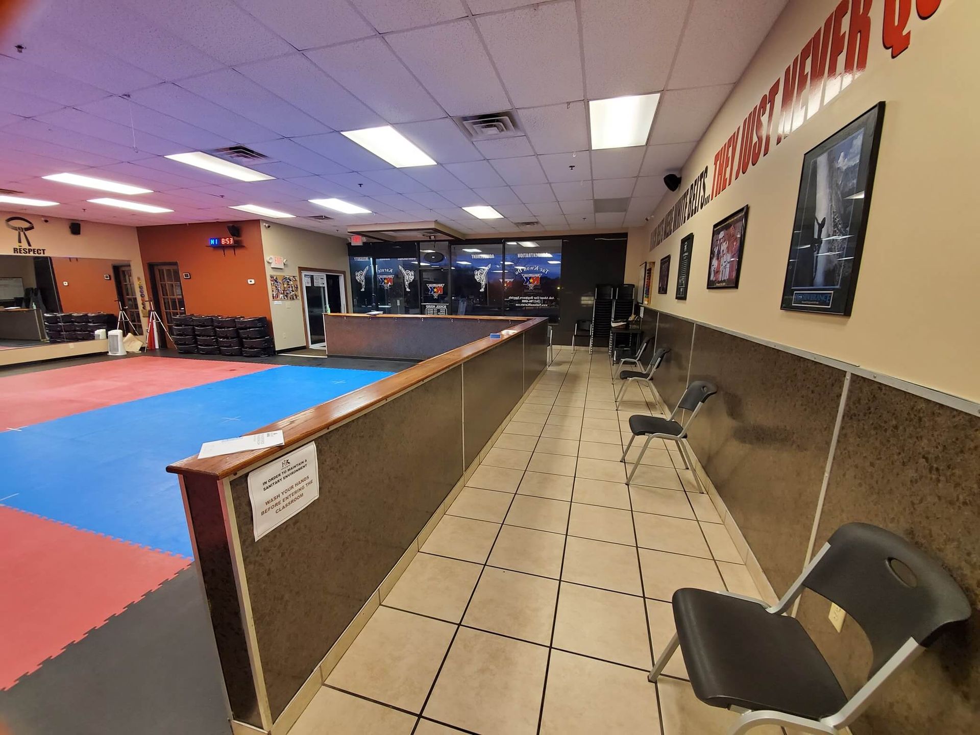 Adults practicing Karate drills at Wisconsin National Karate Kickboxing & Krav Maga in New Berlin, WI for fitness and self-defense. 