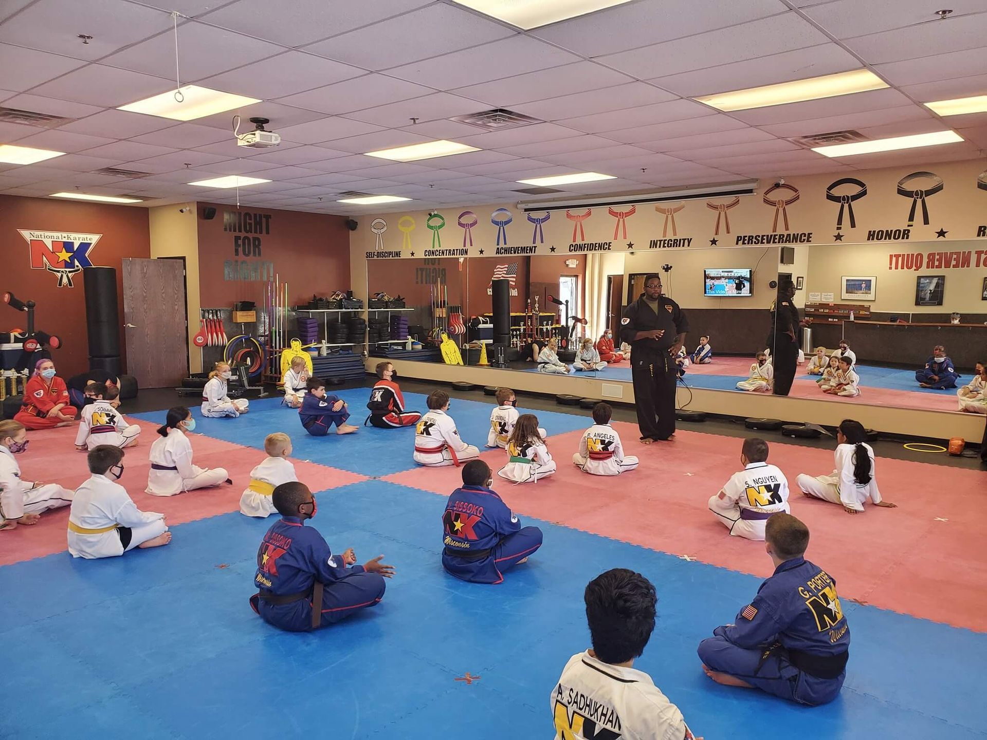 Kids practicing basic Karate stances at Wisconsin National Karate in New Berlin, WI to build focus and confidence.