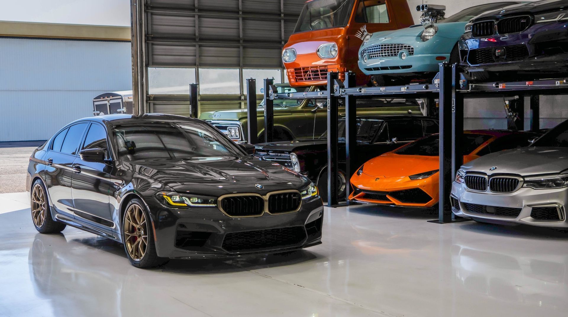 cars parked inside a vehicle storage facility