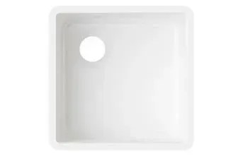 A white square sink with a hole in the middle on a white background.