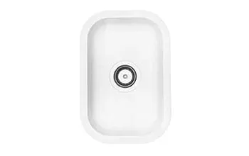 A white kitchen sink with a black drain on a white background.