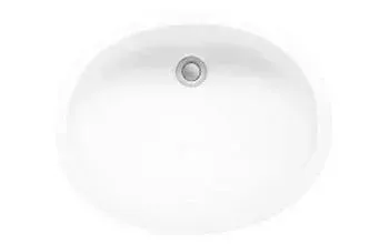 A white sink with a drain hole on a white background.