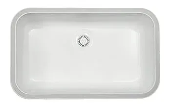 A white kitchen sink with a drain on a white background.