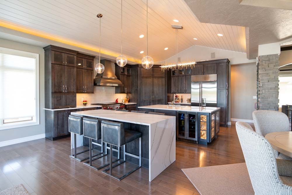 There is a large island in the middle of the kitchen.