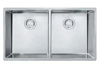 A stainless steel kitchen sink with two drains on a white background.