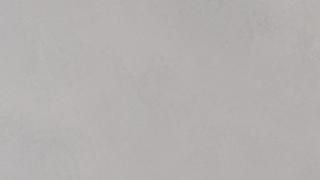 A close up of a white tile texture.