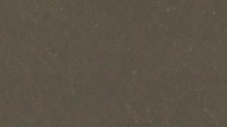 A close up of a brown paper texture.