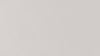 A close up of a white paper texture.