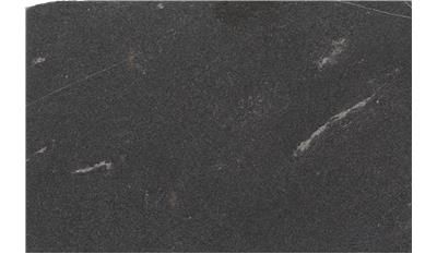 A close up of a black marble slab on a white background.